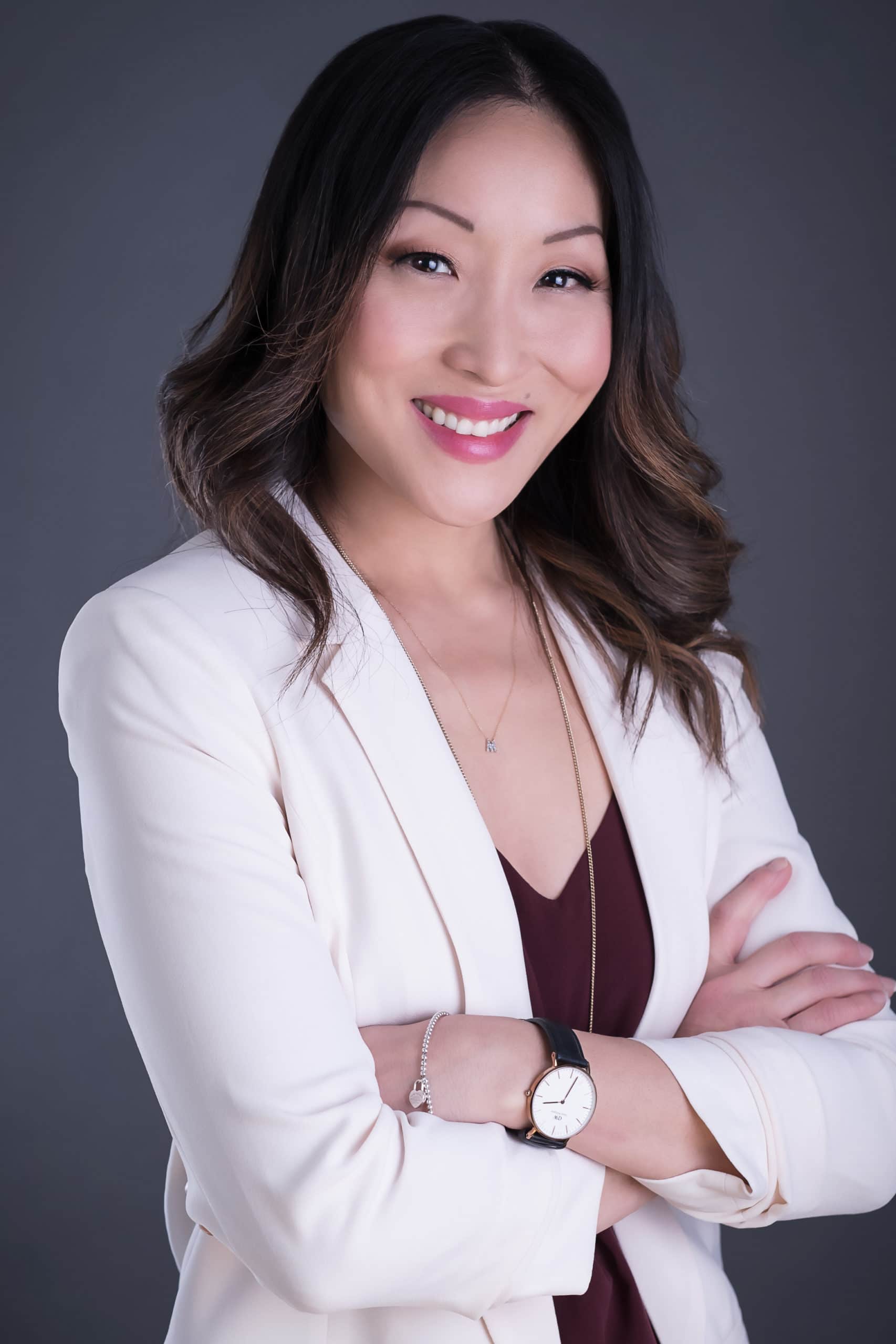 Mina of executrade Recruiting in Vancouver BC has headshots taken with Carlos Taylhardat of Art of Headhsots Photogaraphy Studio. https://artofheadshots.com